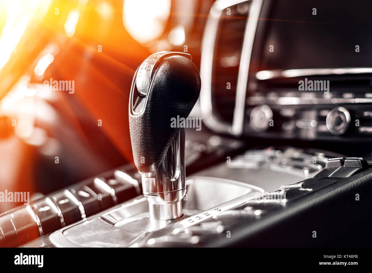 Closeup on automatic transmission lever in modern car. multimedia and