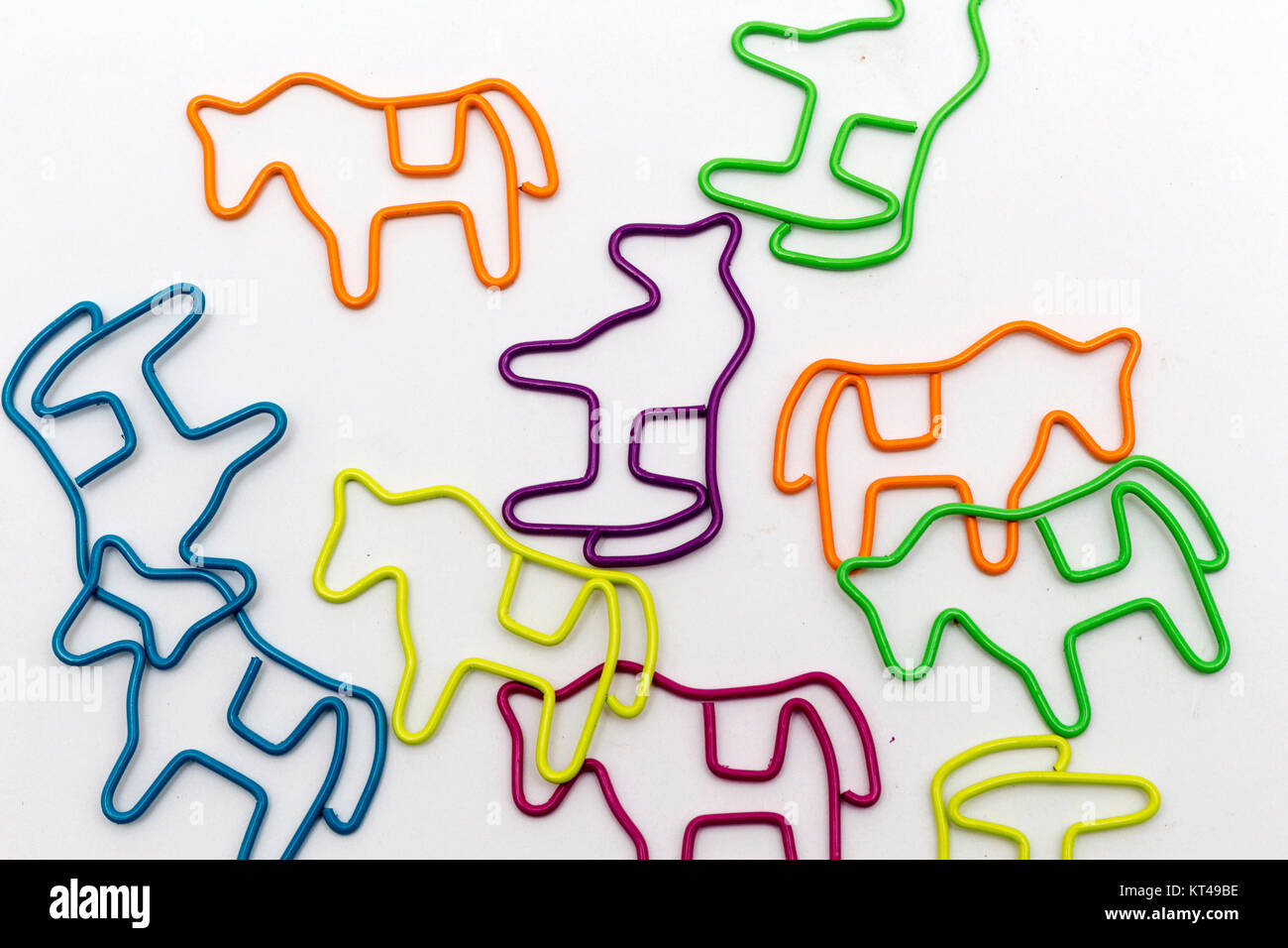 paper clips in horse form on top of each other Stock Photo Alamy