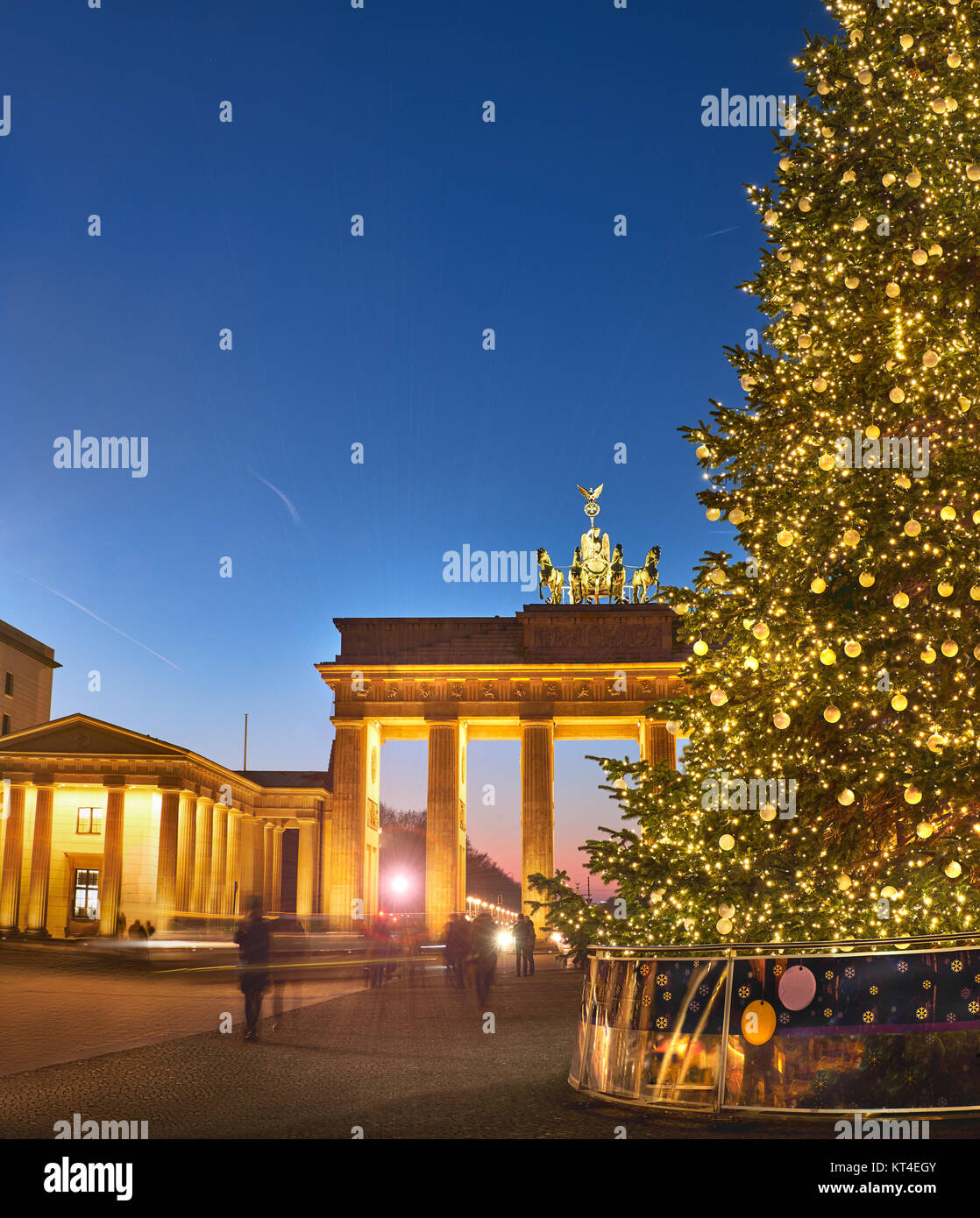 Brandenburger Gate in Berlin with Christmas tree at night with evening