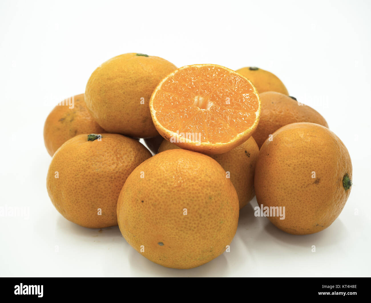 Slice of orange on isolated white background Stock Photo - Alamy