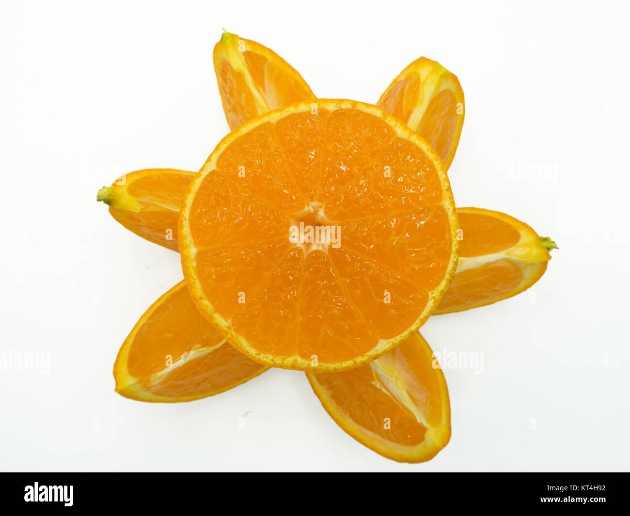 Slice of orange on isolated white background Stock Photo - Alamy