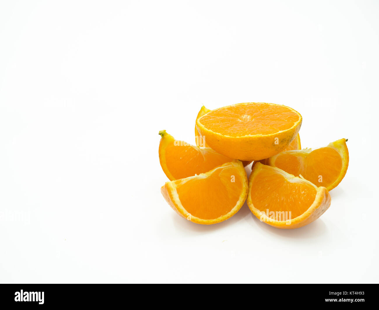 Slice of orange on isolated white background Stock Photo - Alamy