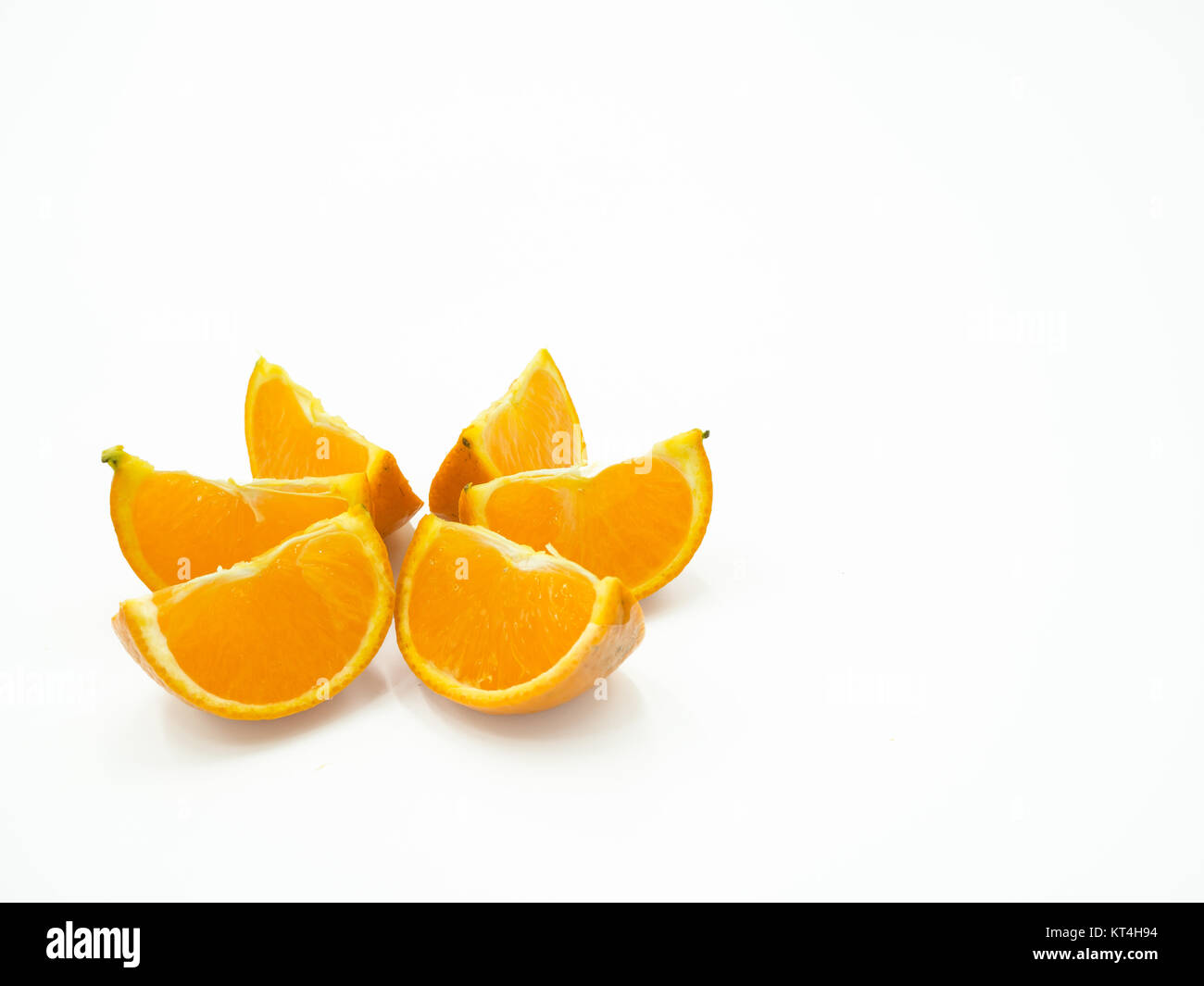 Slice of orange on isolated white background Stock Photo - Alamy