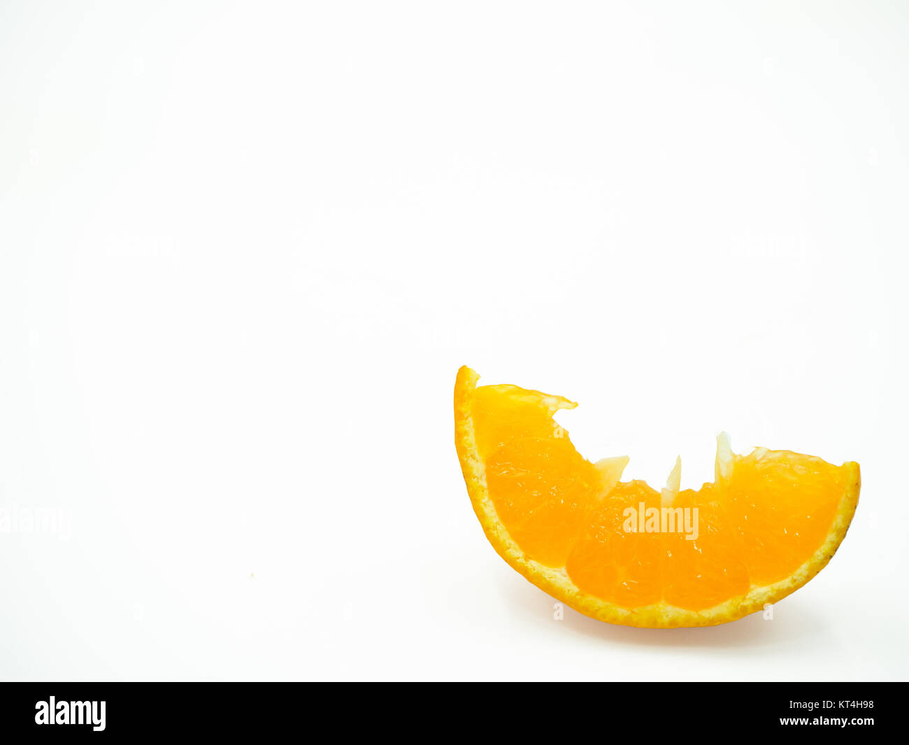 Slice of orange on isolated white background Stock Photo - Alamy