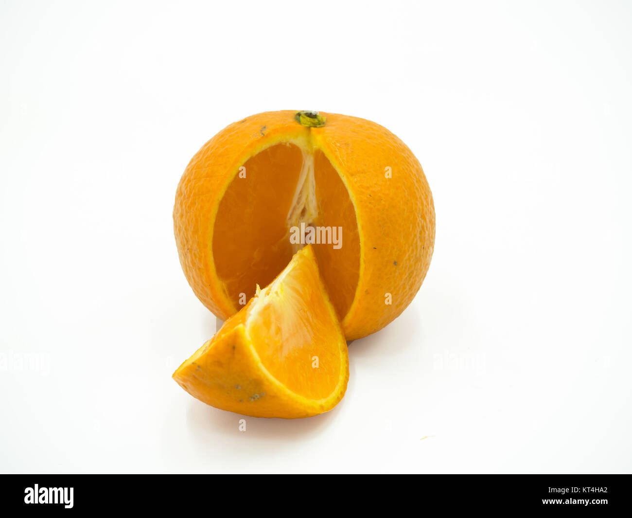 Slice of orange on isolated white background Stock Photo - Alamy