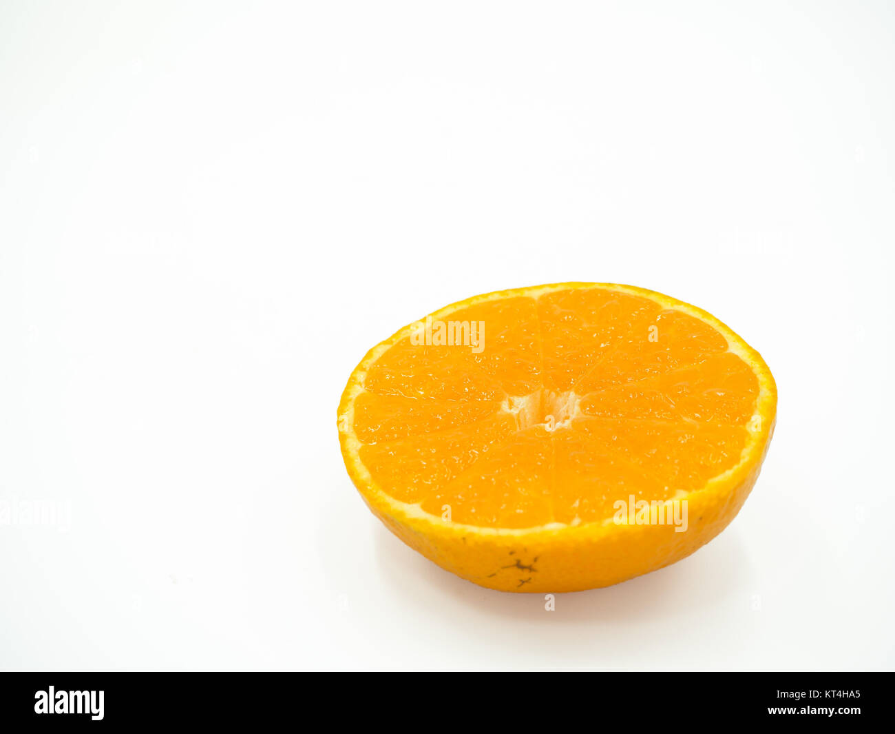 Slice of orange on isolated white background Stock Photo - Alamy