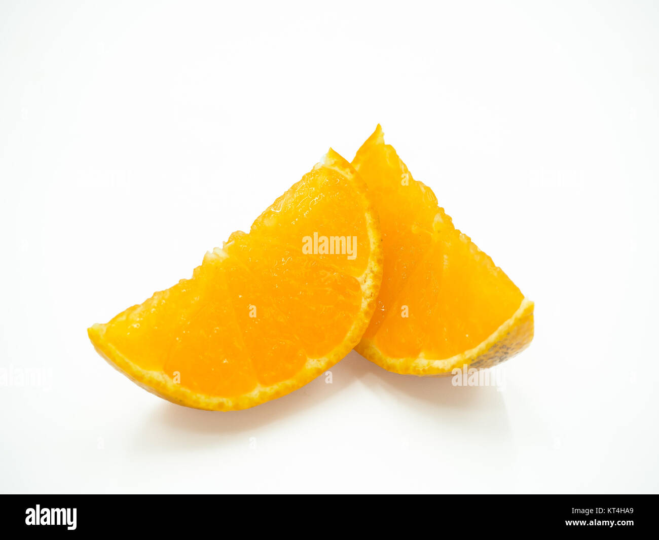 Slice of orange on isolated white background Stock Photo - Alamy