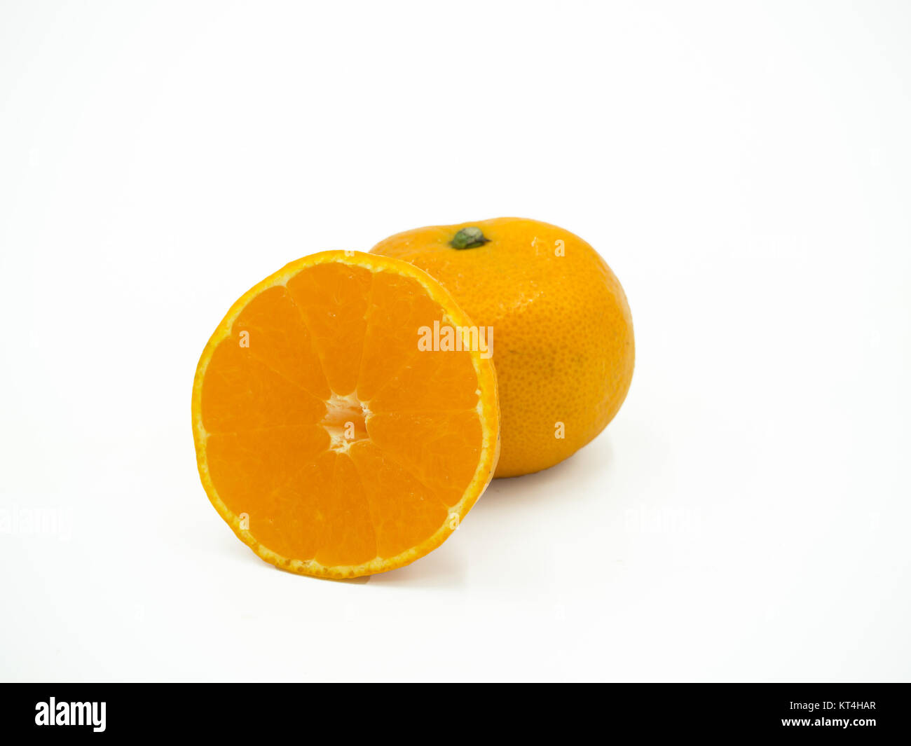 Slice of orange on isolated white background Stock Photo - Alamy