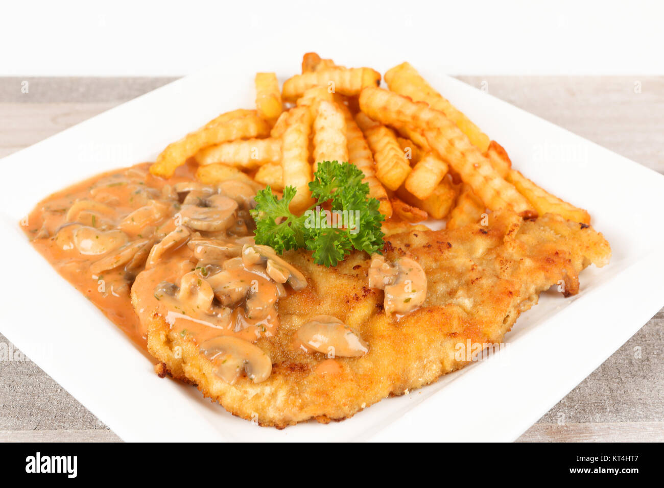 Schnitzel with mushroom sauce Stock Photo Alamy