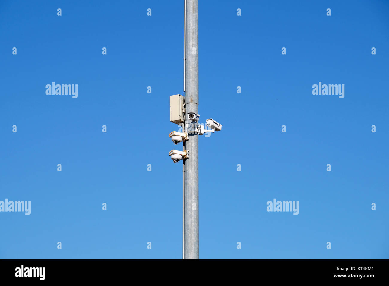 security cctv cameras on a pole with blue sky background Stock Photo