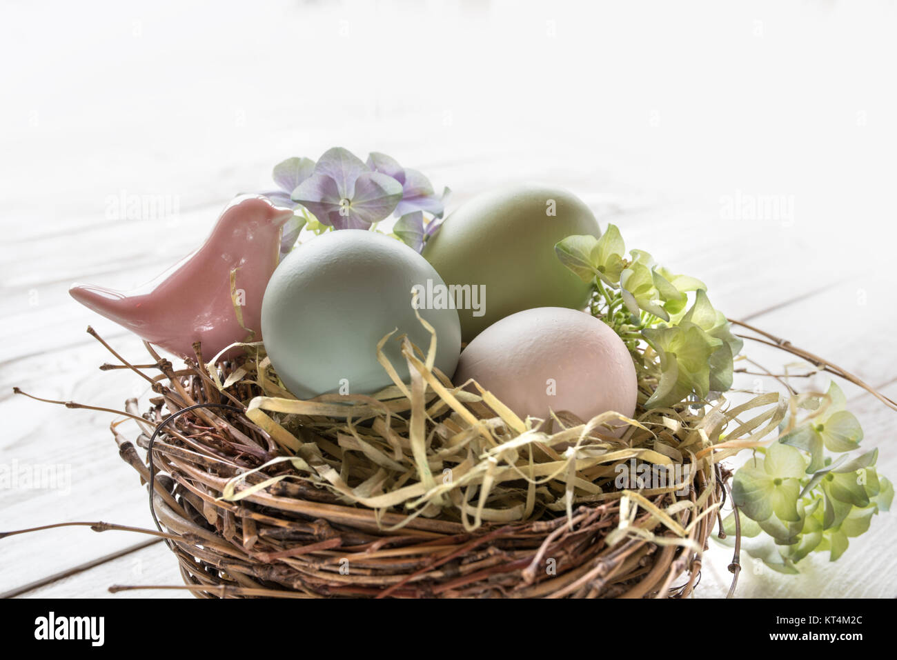 Easter eggs in a nest of straw Stock Photo - Alamy