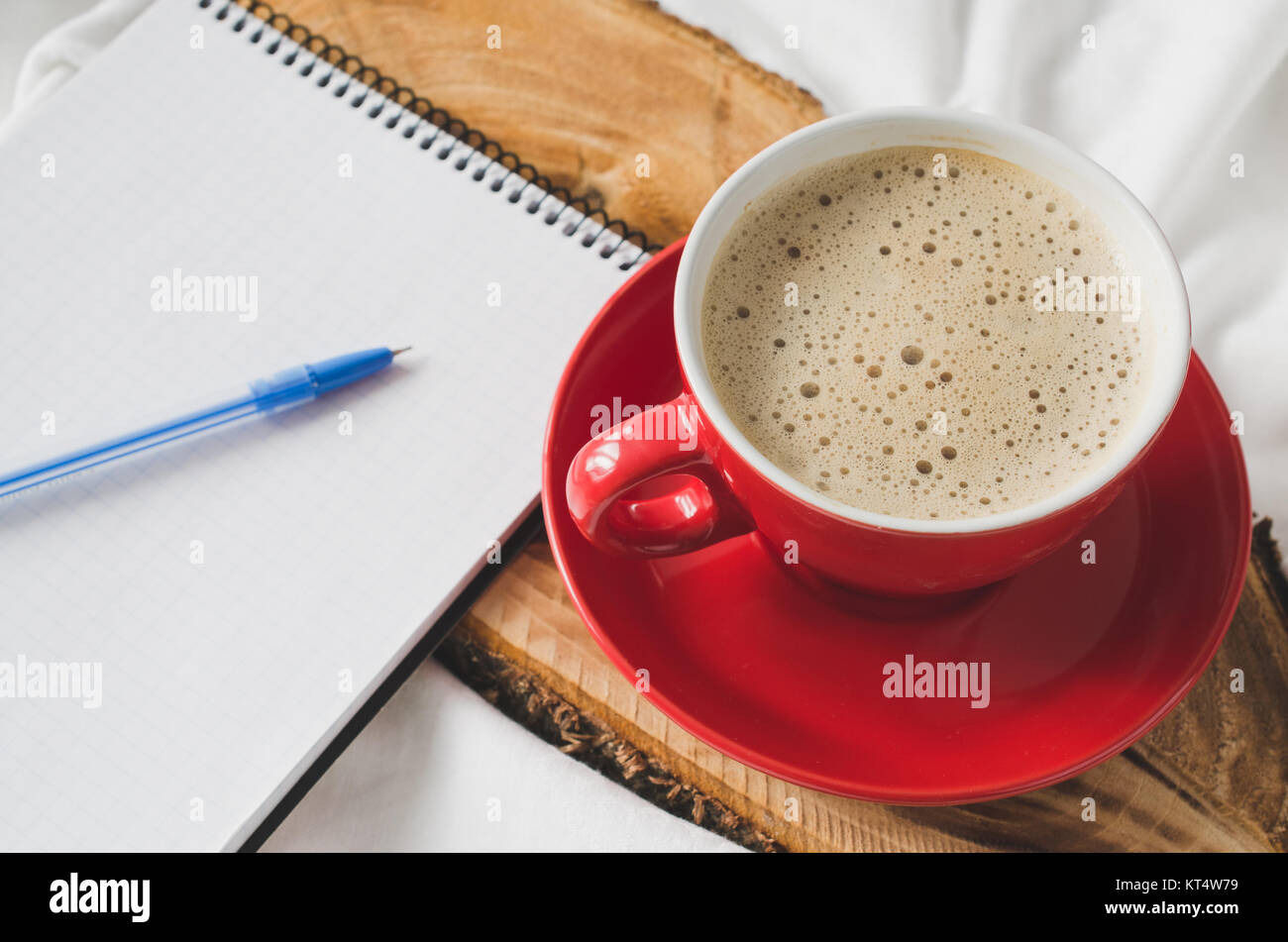 Breakfast in Bed and Empty Notebook for Note. Stock Photo