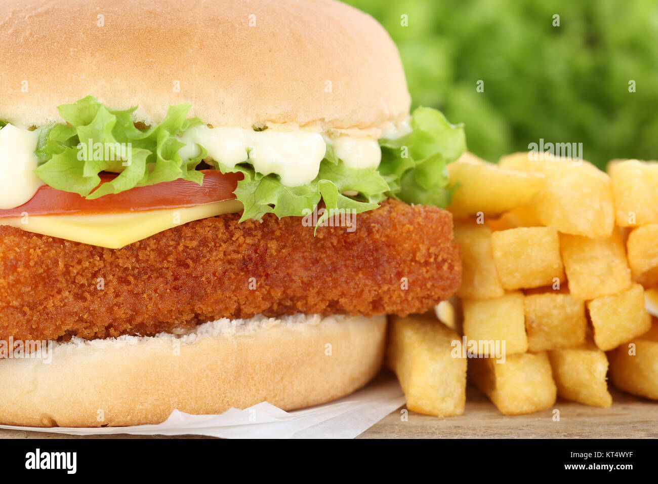 fishburger burger backfisch hamburger with french fries closeup closeup ...
