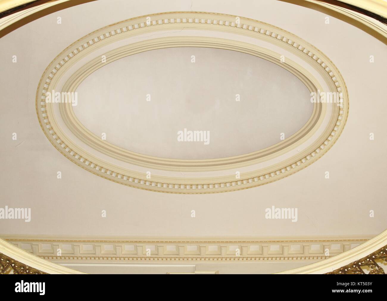 Elaborate oval gold design on ceiling Stock Photo