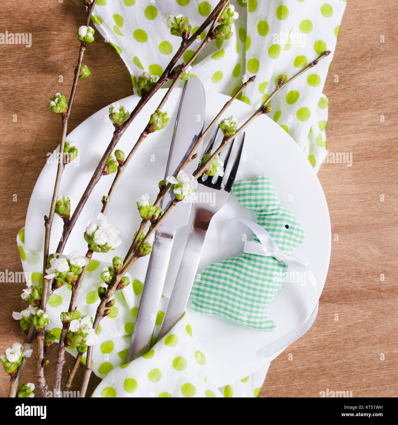 Easter table setting with spring flowers Stock Photo - Alamy