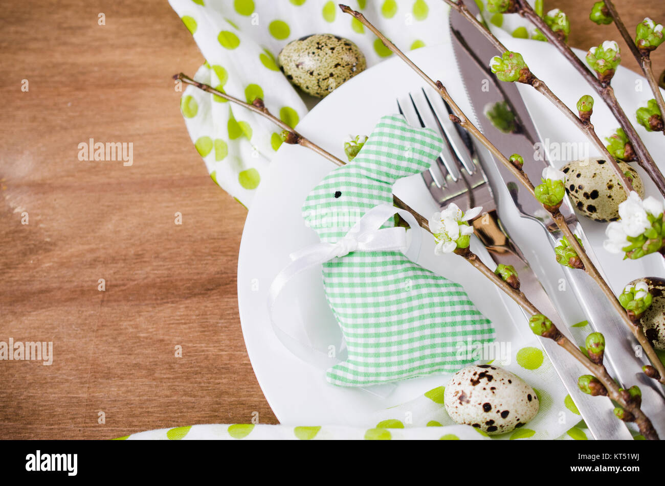 Easter table setting with spring flowers Stock Photo - Alamy