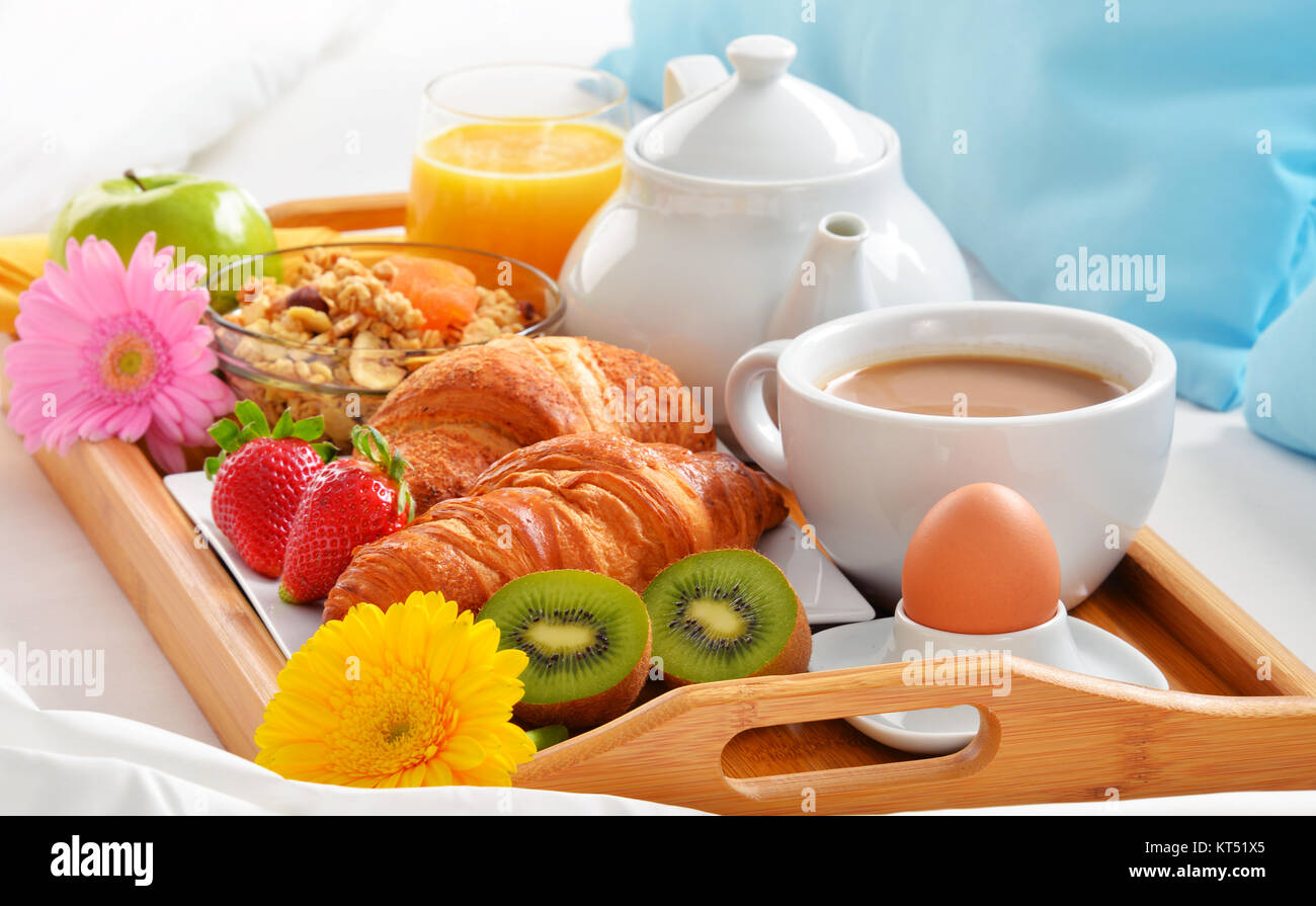 Breakfast tray in bed in hotel room Stock Photo Alamy