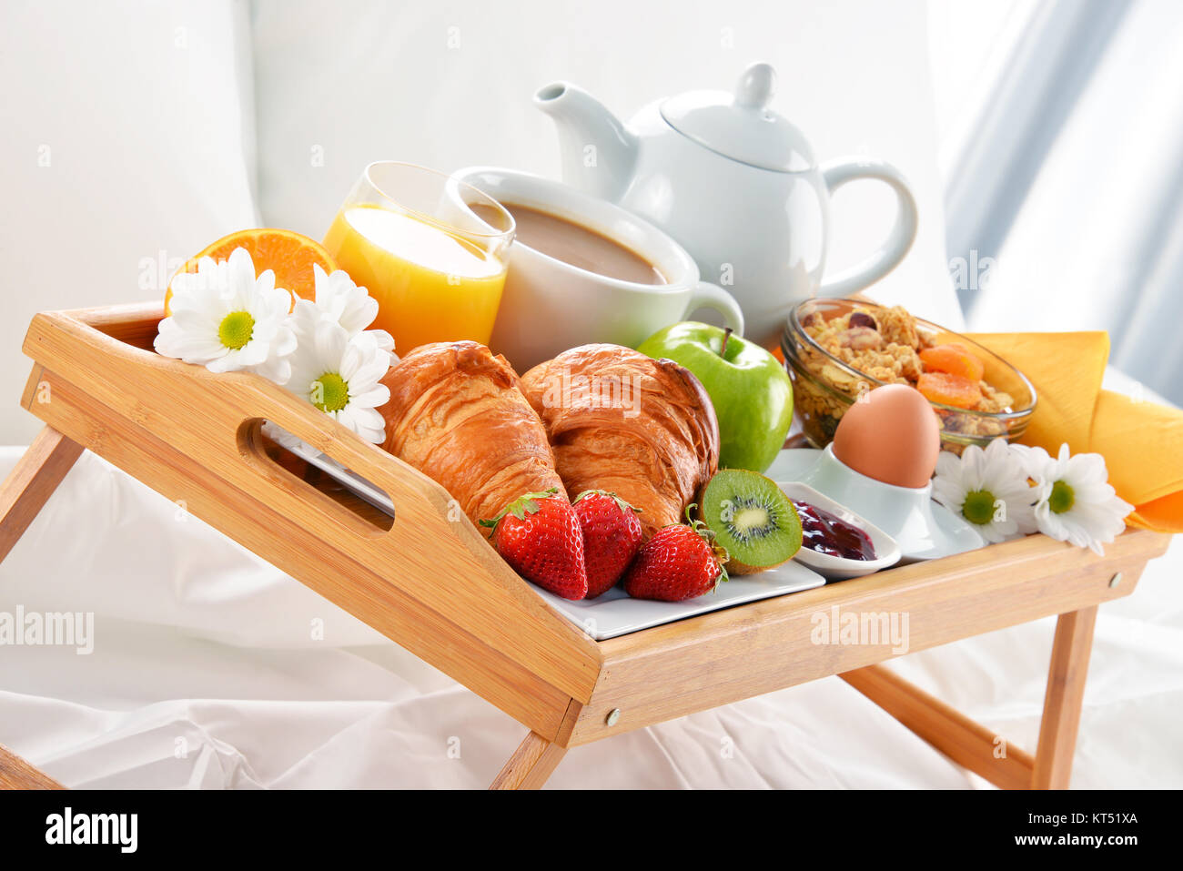Breakfast tray in bed in hotel room Stock Photo - Alamy