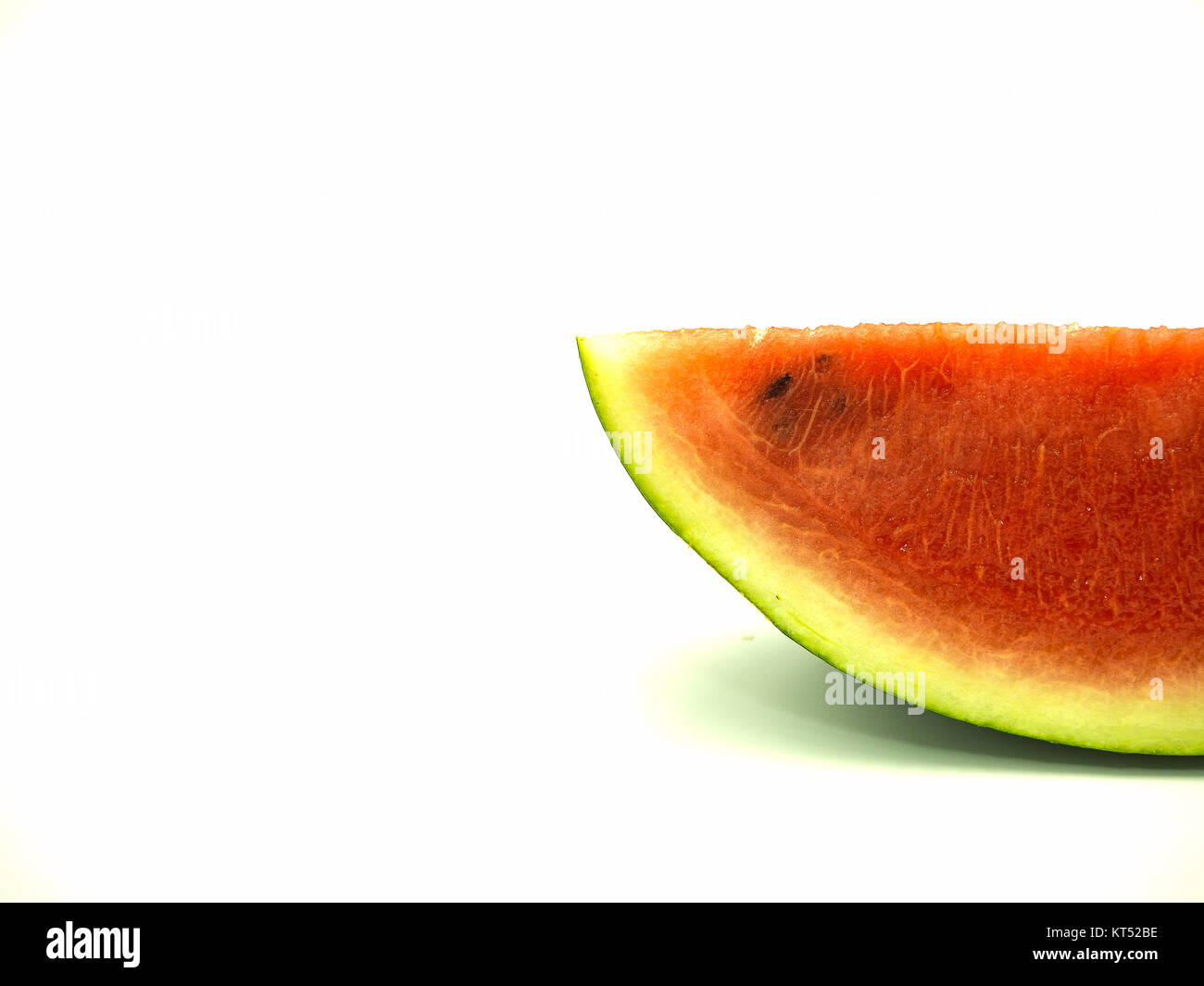 Slice of watermelon on isolated white background Stock Photo - Alamy
