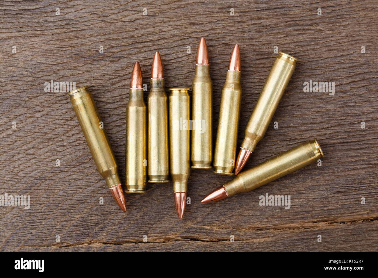 Bullets on rustic wooden background. Stock Photo