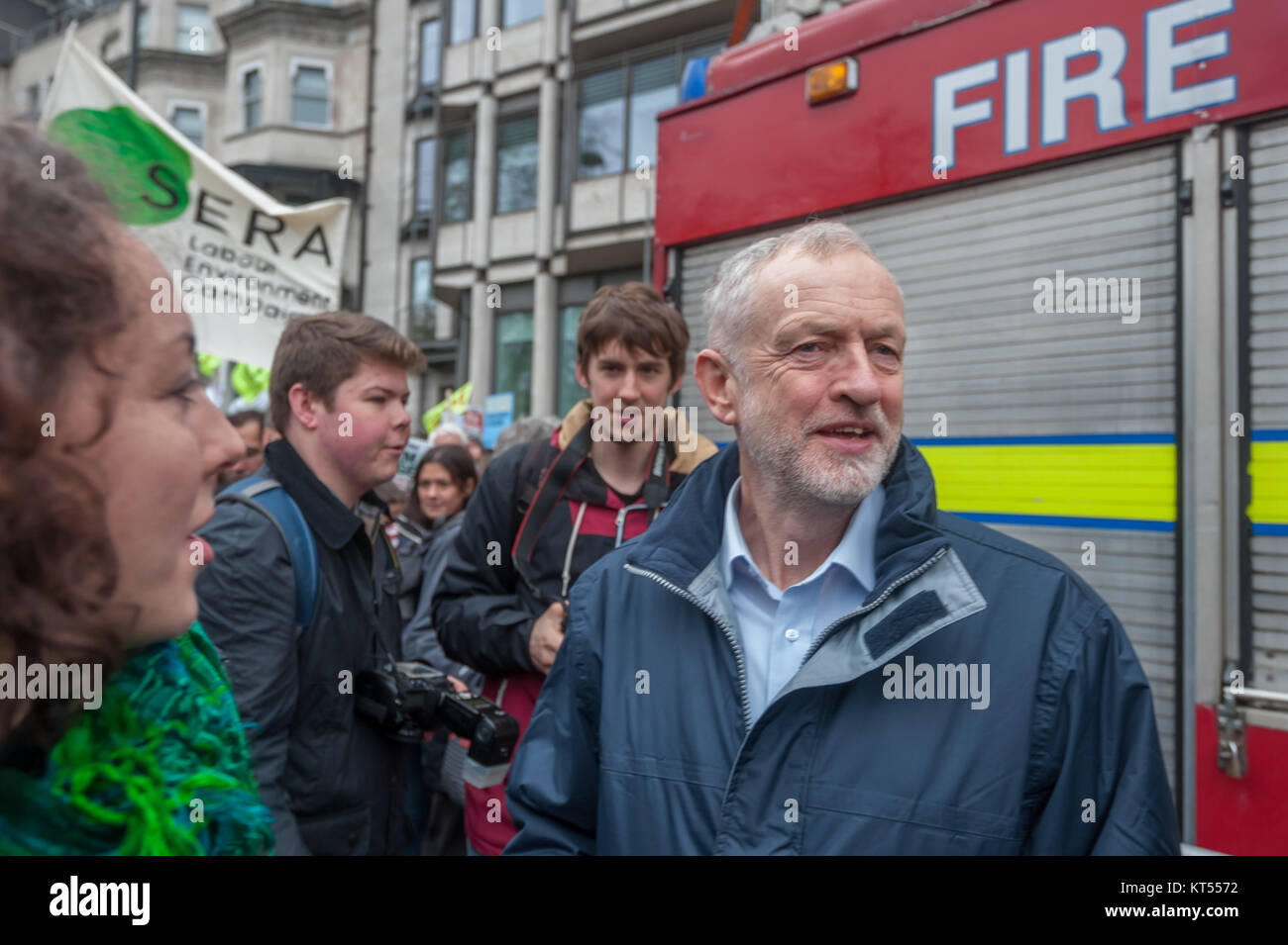 Jeremy Corbyn stands beside the FBU's Fire Engine after making his speech at the start of the People's March for Climate and Jobs. Stock Photo