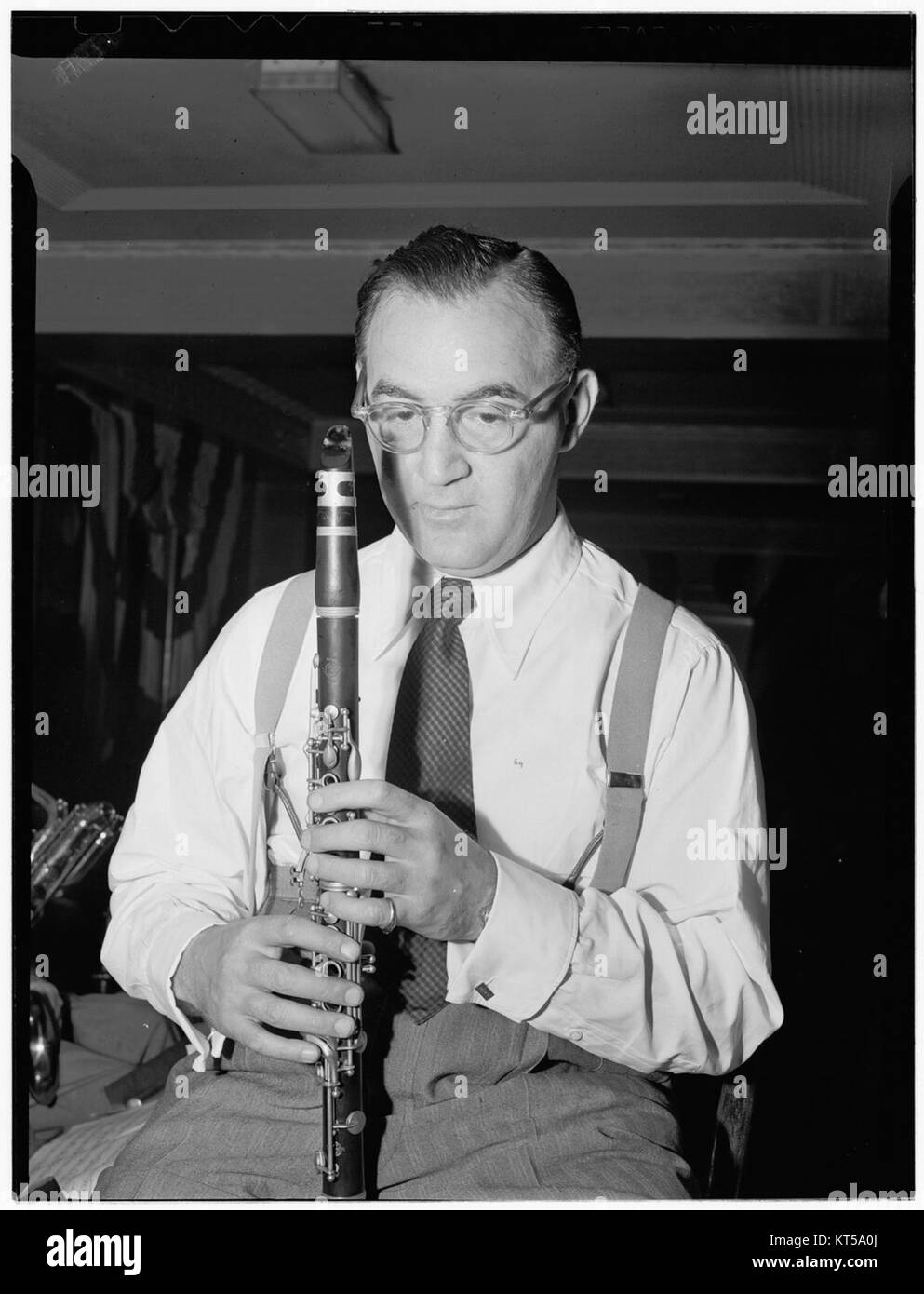This portrait captures legendary jazz musician Benny Goodman, taken at the 400 Restaurant in New York around July 1946. Goodman, known as the 'King of Swing,' played a significant role in the popularization of jazz during the 1930s and 1940s. Stock Photo