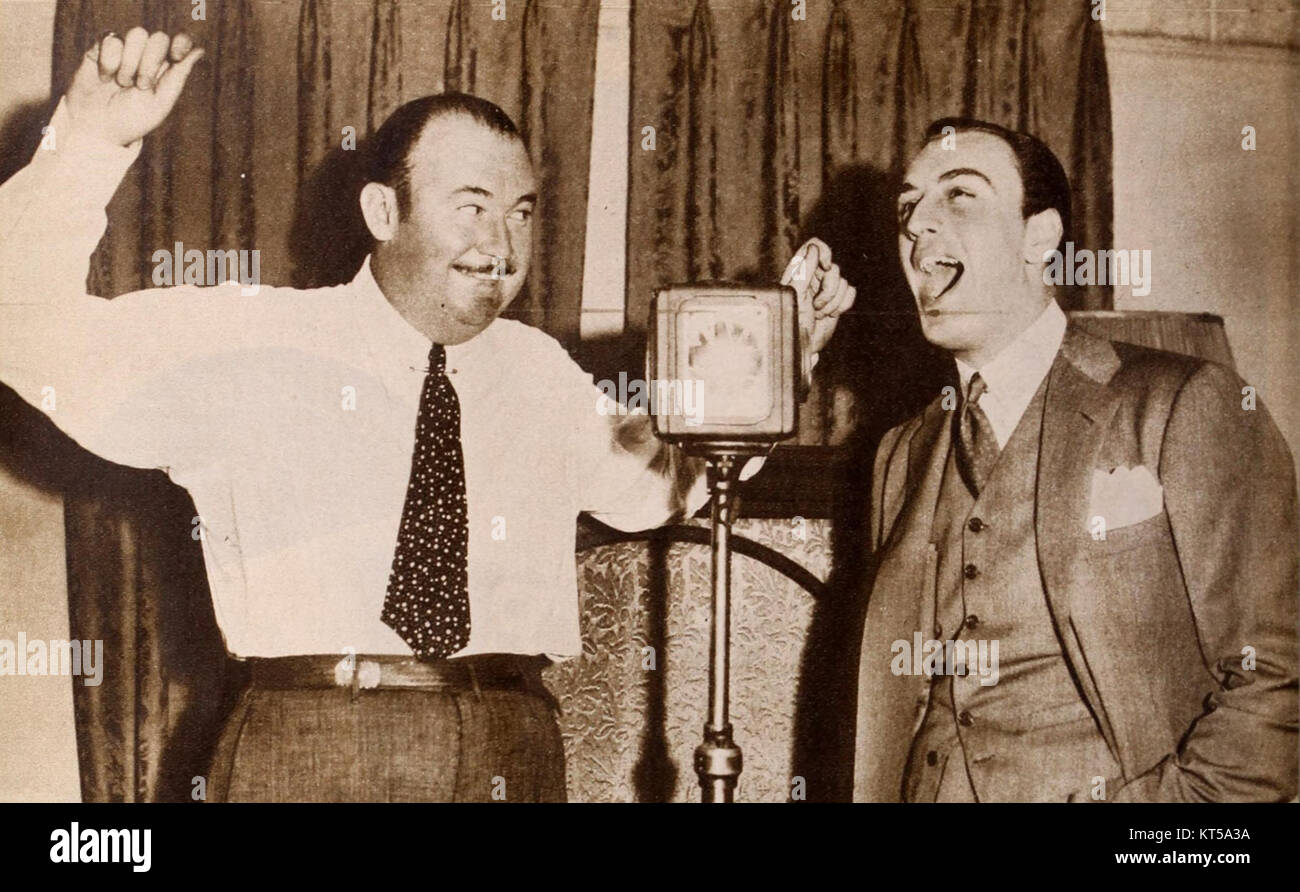 Paul Whiteman, a prominent American bandleader, is pictured with singer and violinist Russ Columbo. Their collaboration was influential in shaping the popular music scene of the 1930s. Stock Photo