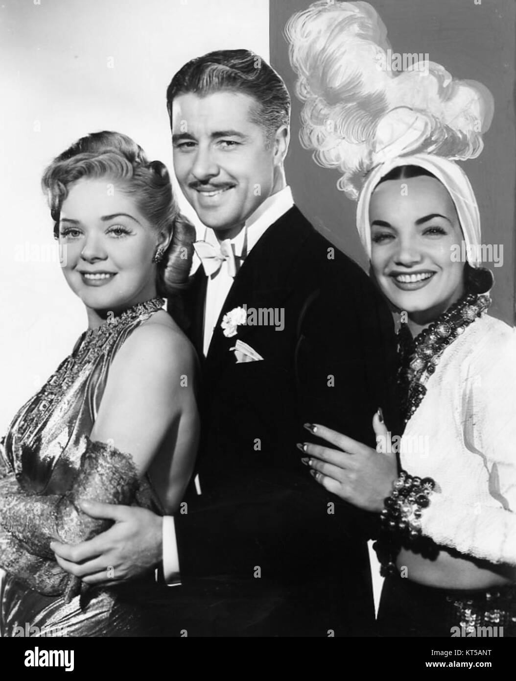 Photo Don Ameche, Alice Faye, and Carmen Miranda in THAT NIGHT IN RIO (1941) Stock Photo