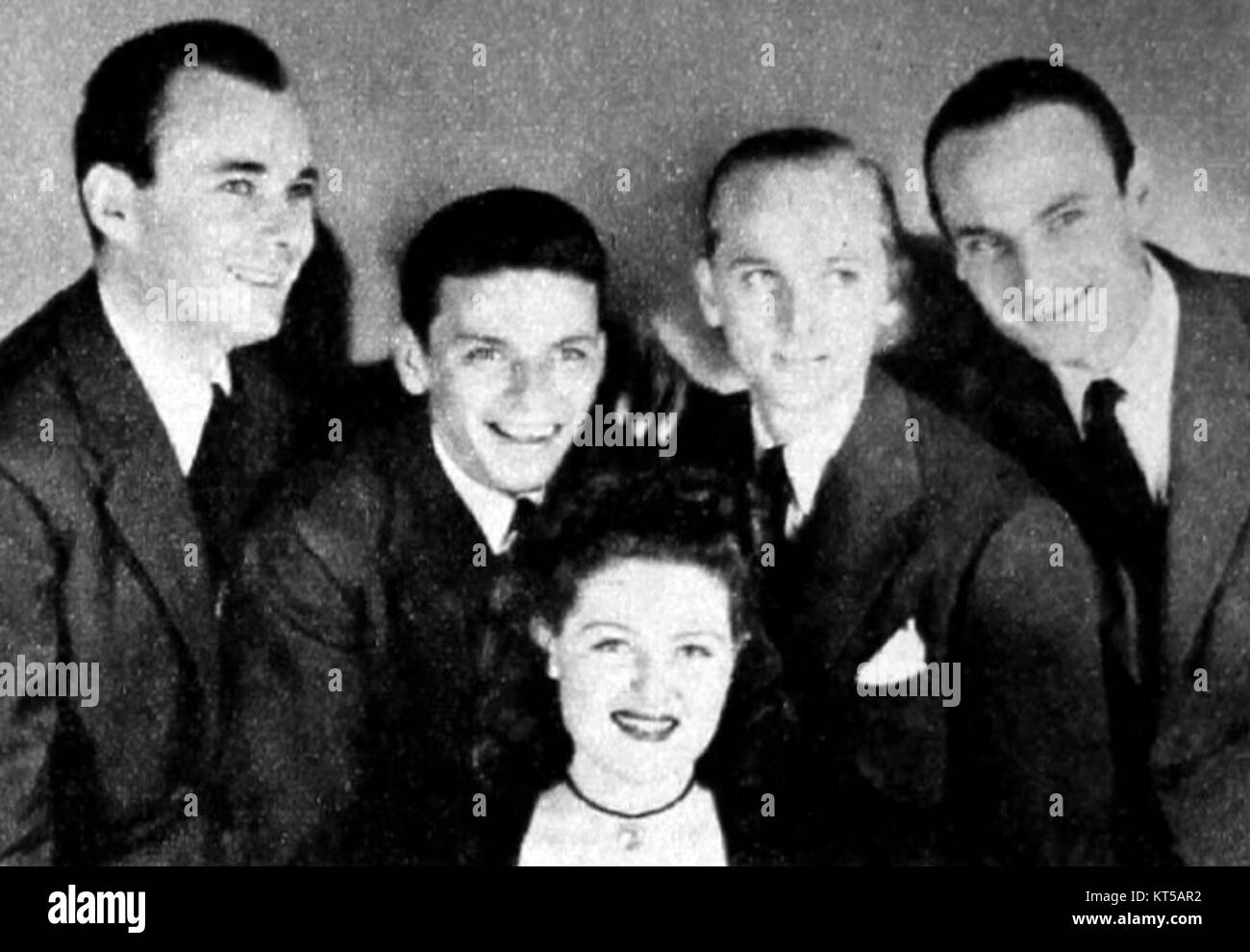 This image shows the Pied Pipers, a famous vocal group, performing alongside Frank Sinatra in 1939. The collaboration was a pivotal moment in the development of American popular music during the swing era. Stock Photo