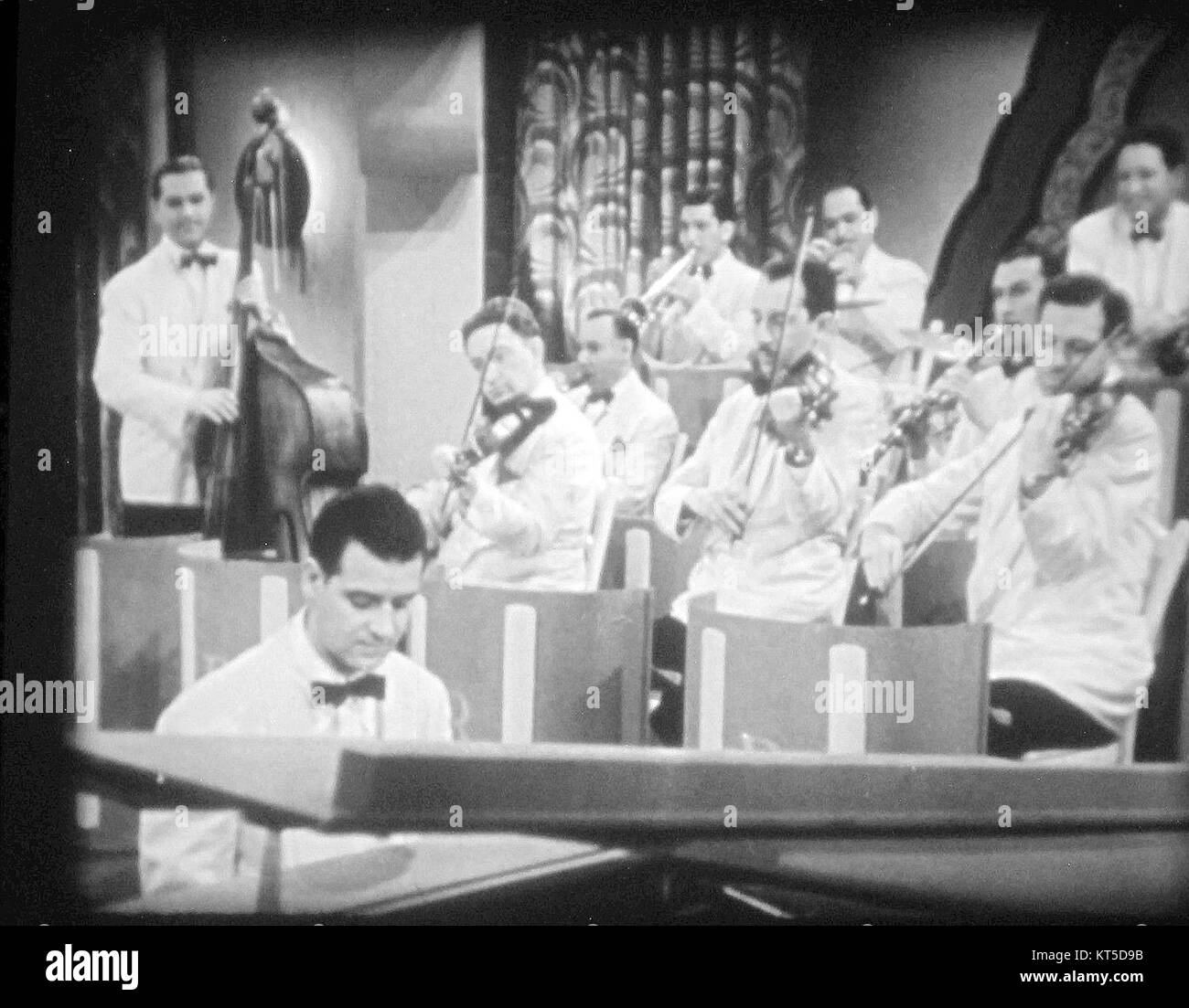 The Ray Sinatra Orchestra was a musical group known for its performances during the big band era. The orchestra was part of the vibrant American jazz and swing scene. Stock Photo