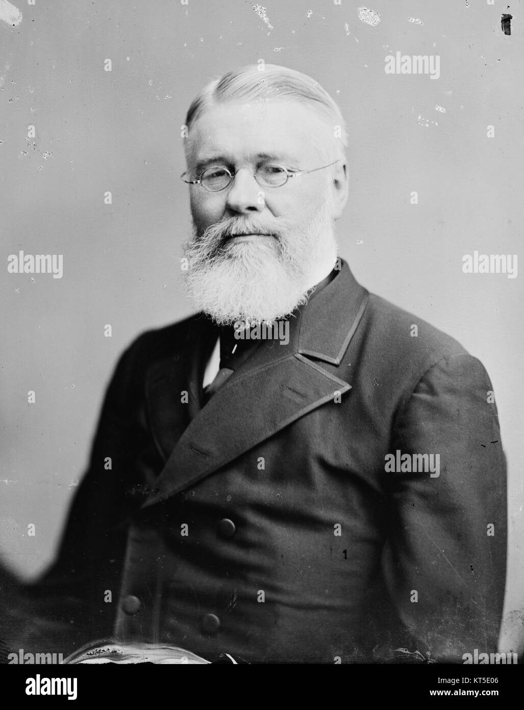 A portrait of Richard Jordan Gatling, inventor of the Gatling gun, photographed by Brady-Handy. This image represents his contribution to military technology in the 19th century. Stock Photo