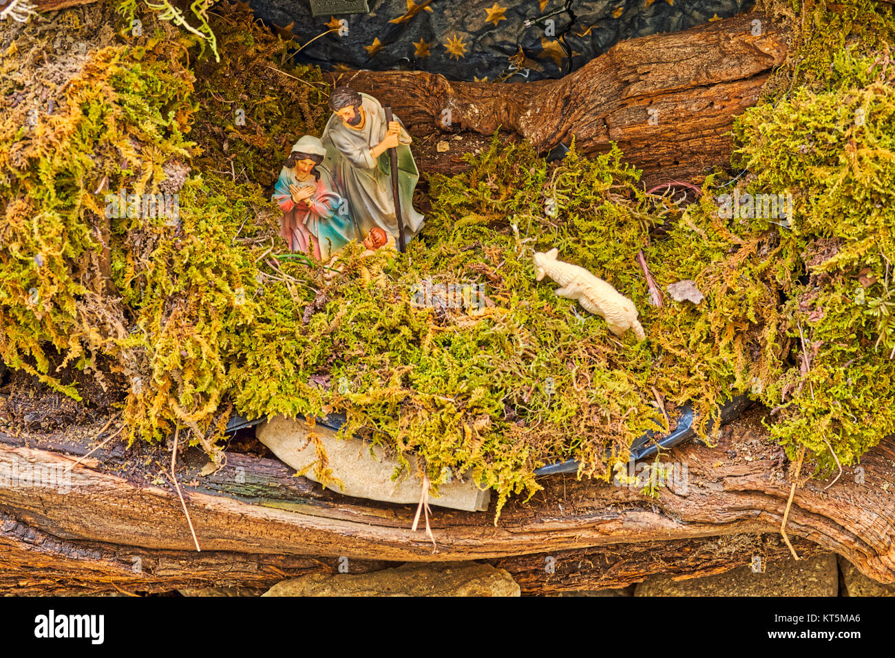 The Blessed Virgin Mary and Saint Joseph holding Baby Jesus in Nativity