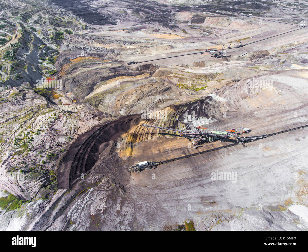 Surface coal mining in Poland. Destroyed land. View from above. Surrealistic landscape. Stock Photo