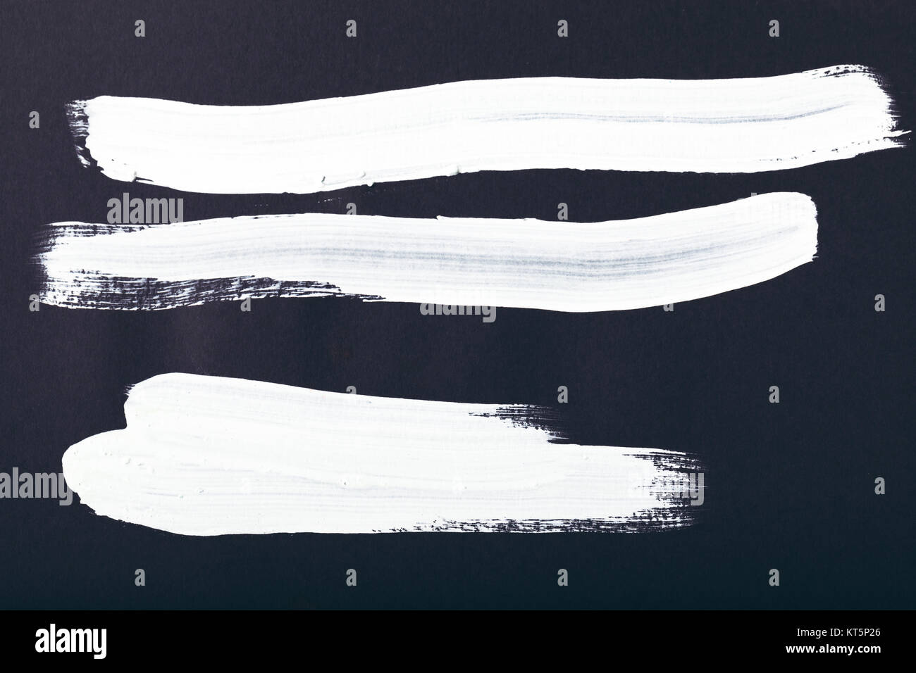 abstract painting with white brush strokes on black Stock Photo - Alamy