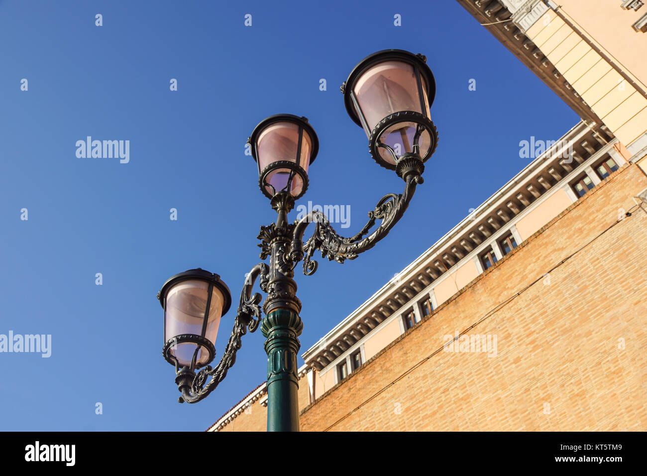 retro vintage street lamp isolated on sky background. Stock Photo