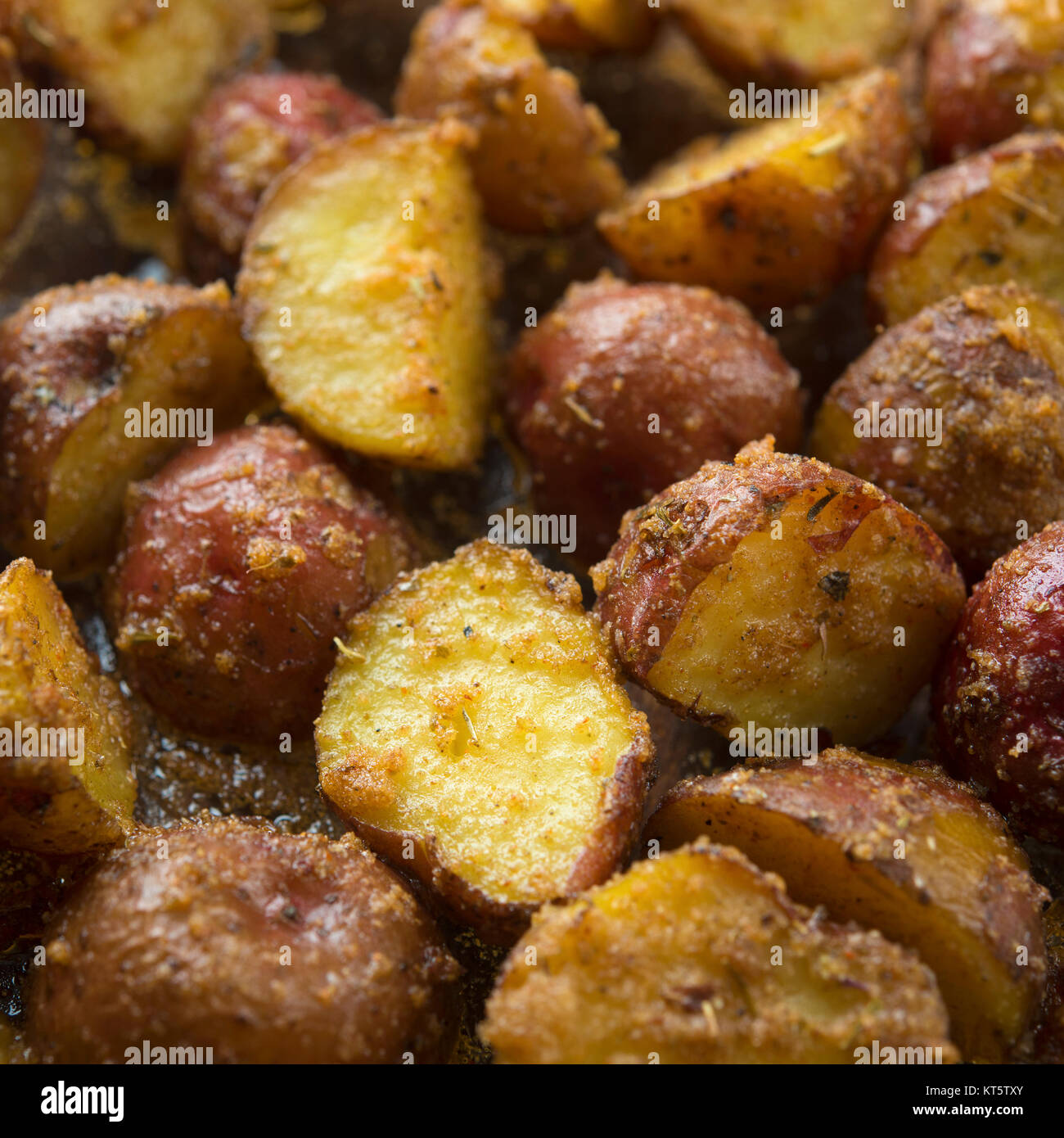 Oven roasted potatoes close up Stock Photo - Alamy