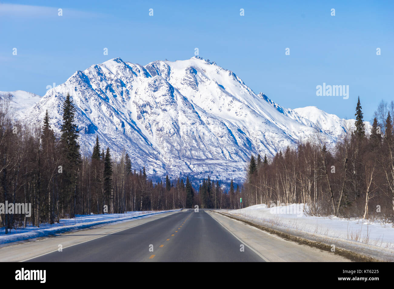 Spectacular mountain vista driving from Anchorage to Fairbanks on a clear day in March Stock Photo