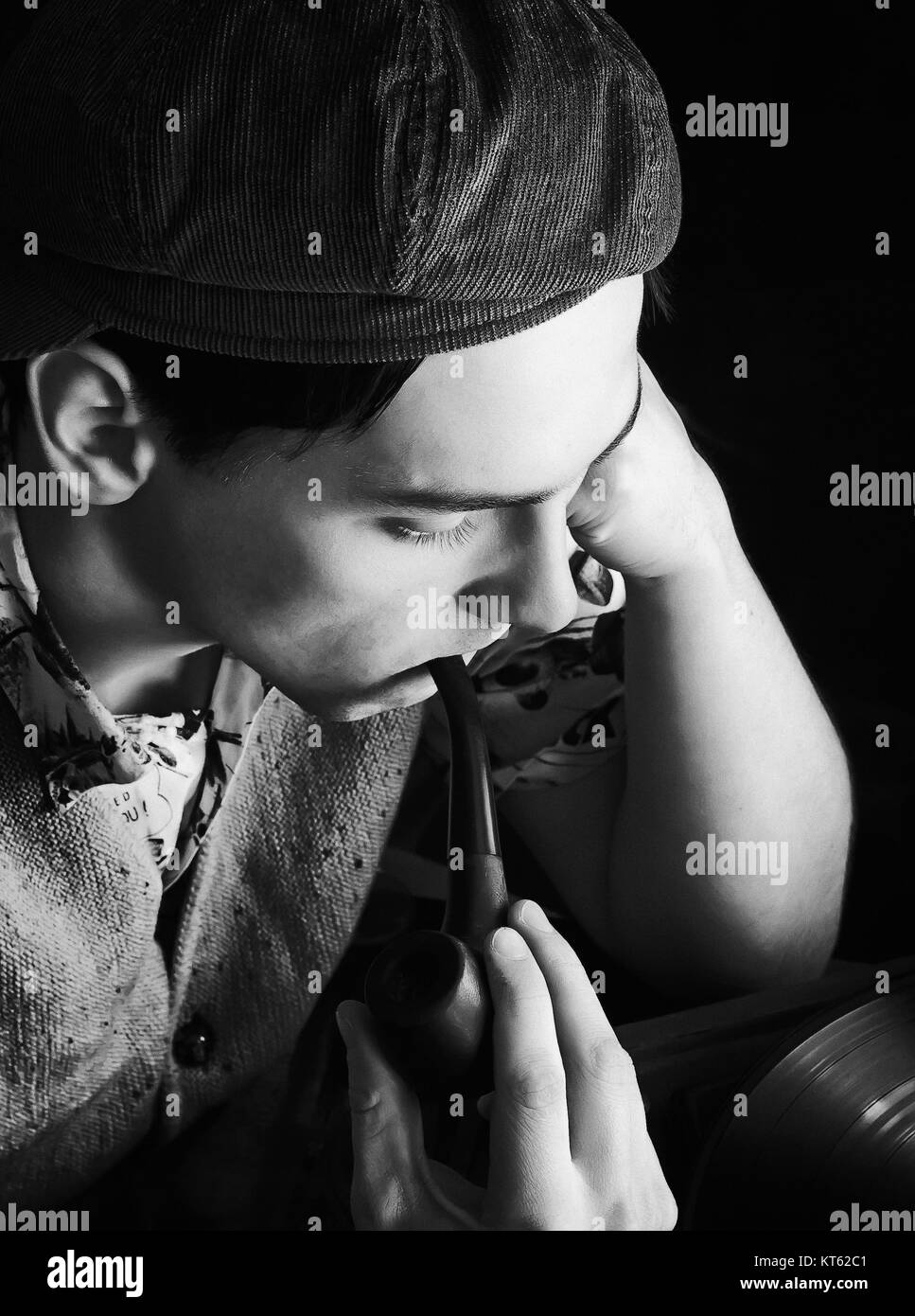 Monochrome Vintage Portrait Of A Man With Pipe Stock Photo