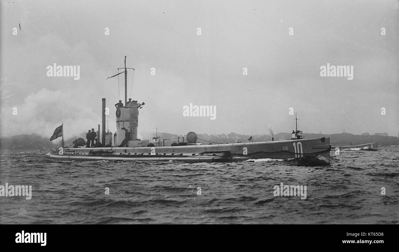 The submarine U-10, seen here at full speed, is a German naval vessel. U-boats were crucial to naval warfare during World War I and World War II, with U-10 being a part of the German fleet during these periods. Stock Photo