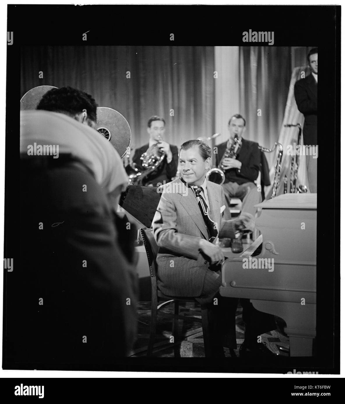 (Portrait of Claude Thornhill, Willie Wechsler, Micky Folus, and Joe Shulman, Columbia Pictures studio, the making of Beautiful Doll, New York, N.Y., ca. Sept. 1947)  (5476582336) Stock Photo