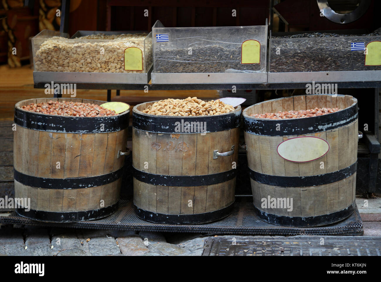 Organic nuts sold on market hold in wooden barrels Stock Photo Alamy