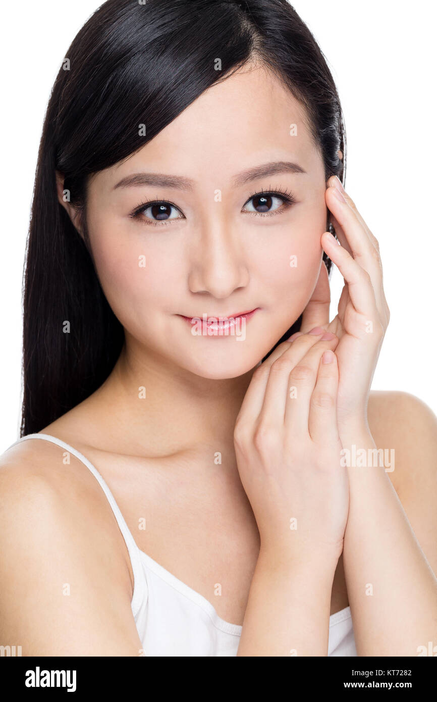 Smiling young beautiful woman face Stock Photo - Alamy