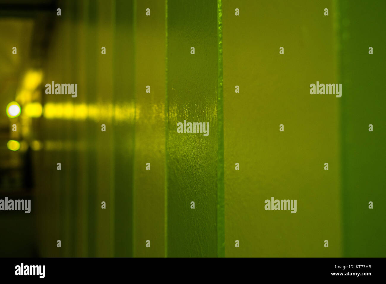 Yellow green wall with lights Stock Photo Alamy