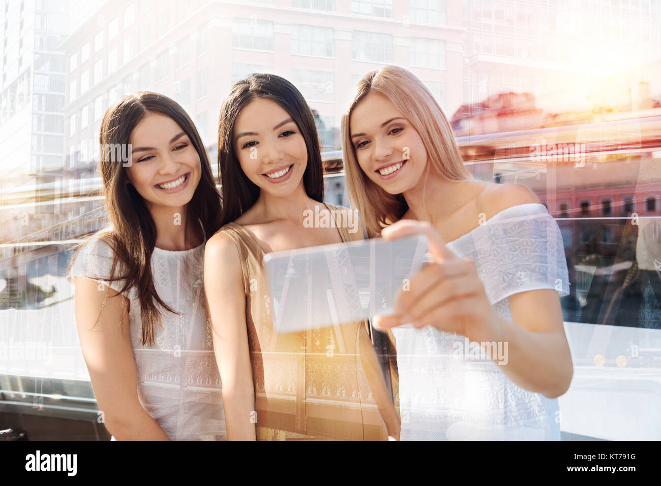 Attractive young women taking a selfie Stock Photo