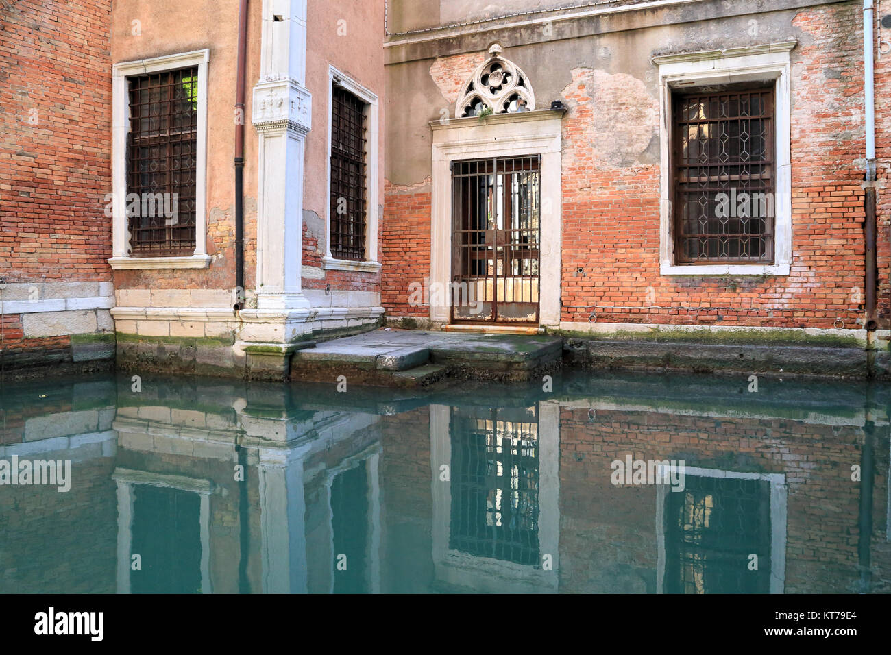 Venice church, mystic canal reflections, Ospizio Badoer Stock Photo