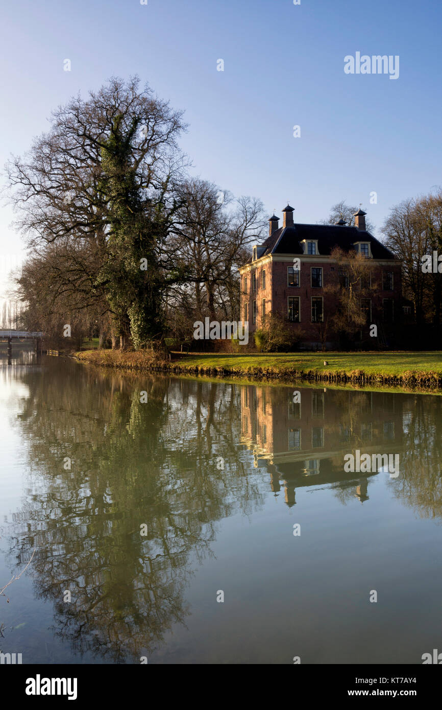 Rhijnauwen castle on the banks of the river Kromme Rijn near Bunnik ...