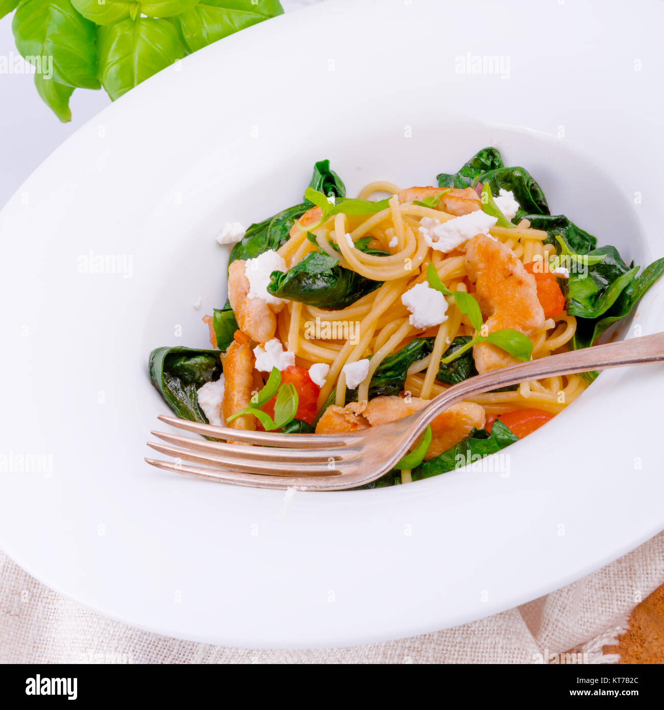 Chicken spinach pasta Stock Photo - Alamy