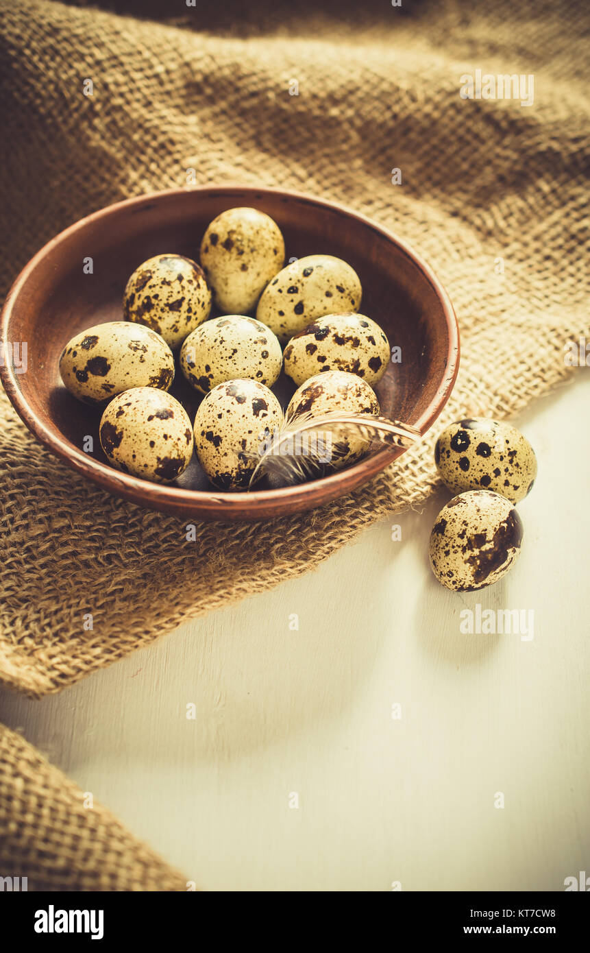 Fresh Organic Quail Eggs in a Ceramic Bowl. Stock Photo