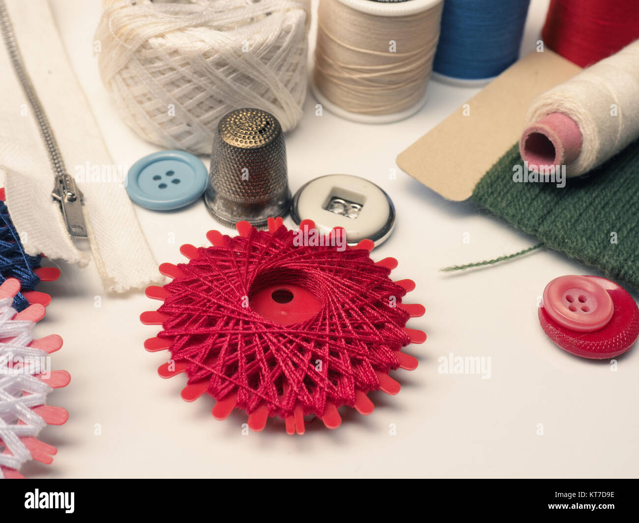 Old used sewing tools and yarn on a table, vintage color toned Stock ...