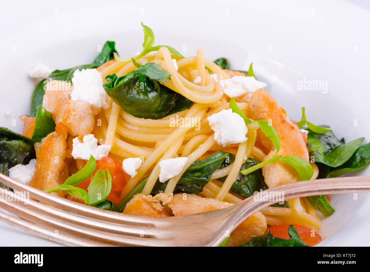 Chicken spinach pasta Stock Photo - Alamy